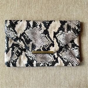 Style and Co clutch. Never been used!